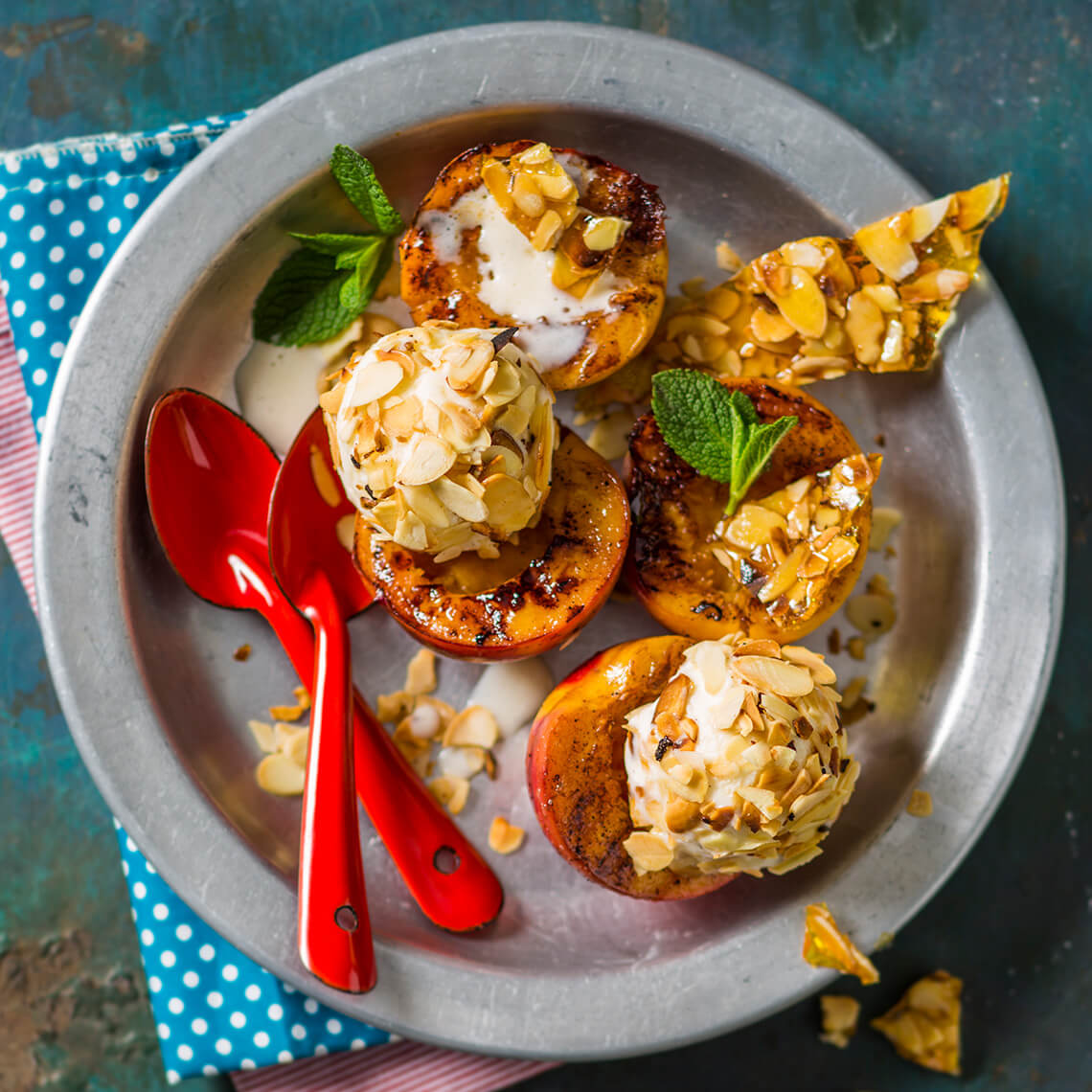 Nectarines with almond praline and ice cream